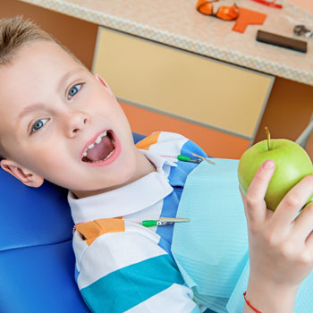 A kid visiting a dentist